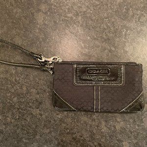 COACH wristlet in signature black fabric with black leather accents